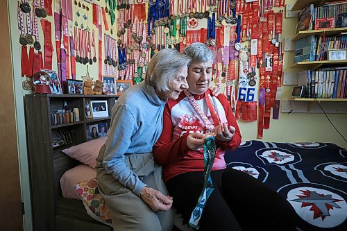 Ruth Bonneville / Free Press
LOCAL/SPORTS - Brita Hall
Photo of Brita Hall in her room with all her medals on the wall. Also with her mom, Birgit Hall.
Ahead of her trip to the World Winter Games in Turin, Italy next month, MB Sports Hall of Famer Brita Hall is deep in training mode. The four-time Paralympian, at age 55, continues to not only compete, but improve in cross-country skiing, building on a skillset she started developing as a teenager. Over the course of a long career in Nordic sports in Manitoba, Hall has been a trailblazer, becoming the first Special Olympic athlete to be enshrined in the MB Sports Hall of Fame last fall.
See story by Ben Waldman
February 19/25
