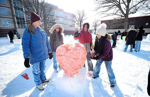 Ruth Bonneville / Free Press

Standup - SCHOOL SNOW SCULPTURES

Grade 8 students from Ecole Viscount Alexander take part in a  snow-building extravaganza with their classmates as they sculpt a heart out of snow as part of the immersion elementary school's Festival du Voyageur celebrations  Friday.  


February  21st, 2025