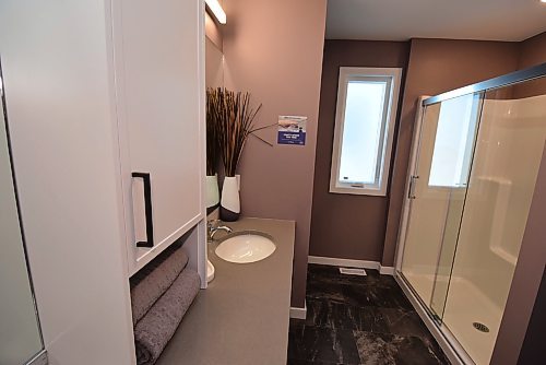 Todd Lewys / Free Press
Luxury and functionality come together in the elegant ensuite.