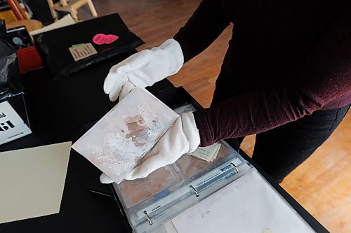 MIKE DEAL / FREE PRESS
Brenda Stuart is a photographer who specializes in solargraphy, a photographic method using a pinhole camera to capture the path of the sun. This is a form of pinhole photography using a long-exposure technique where the arc of the sun’s trails are recorded onto photographic paper as the sun’s position in the sky changes from solstice to solstice. Images can be made over a day, a week, a month, a year. Or even longer. A clear sunny day will record a strong bright arc across the photo paper. When the days are cloudy or partially cloudy the camera records dots and dashes.
Brenda keeps an archive of her photographic paper negatives in her studio some of which show the hardships they endured being left out in a pin hole camera for months.
Reporter: AV Kitching
250225 - Tuesday, February 25, 2025.