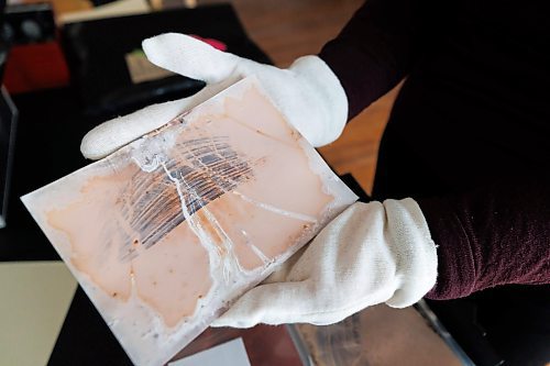 MIKE DEAL / FREE PRESS
Brenda Stuart is a photographer who specializes in solargraphy, a photographic method using a pinhole camera to capture the path of the sun. This is a form of pinhole photography using a long-exposure technique where the arc of the sun’s trails are recorded onto photographic paper as the sun’s position in the sky changes from solstice to solstice. Images can be made over a day, a week, a month, a year. Or even longer. A clear sunny day will record a strong bright arc across the photo paper. When the days are cloudy or partially cloudy the camera records dots and dashes.
Brenda keeps an archive of her photographic paper negatives in her studio some of which show the hardships they endured being left out in a pin hole camera for months.
Reporter: AV Kitching
250225 - Tuesday, February 25, 2025.