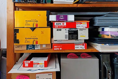 MIKE DEAL / FREE PRESS
Brenda Stuart is a photographer who specializes in solargraphy, a photographic method using a pinhole camera to capture the path of the sun. This is a form of pinhole photography using a long-exposure technique where the arc of the sun’s trails are recorded onto photographic paper as the sun’s position in the sky changes from solstice to solstice. Images can be made over a day, a week, a month, a year. Or even longer. A clear sunny day will record a strong bright arc across the photo paper. When the days are cloudy or partially cloudy the camera records dots and dashes.
Brenda has boxes of old photographic paper in her studio she uses to make her solargraphs.
Reporter: AV Kitching
250225 - Tuesday, February 25, 2025.