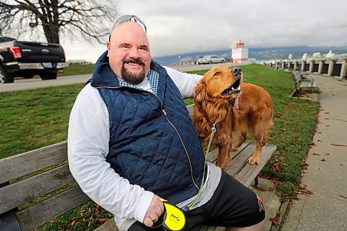 Chris Parlow and his dog, Delta, in Stanley Park, in Vancouver, B.C., Wednesday, November 27th, 2024. Chris is a recovering gambler who hasn't gambled since 2009. He speaks about his addiction which nearly led him to take his own life. (TREVOR HAGAN / WINNIPEG FREE PRESS)