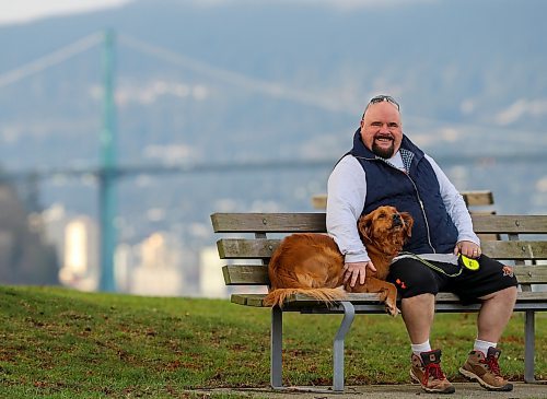 Chris Parlow and his dog, Delta, in Stanley Park, in Vancouver, B.C., Wednesday, November 27th, 2024. Chris is a recovering gambler who hasn't gambled since 2009. He speaks about his addiction which nearly led him to take his own life. (TREVOR HAGAN / WINNIPEG FREE PRESS)