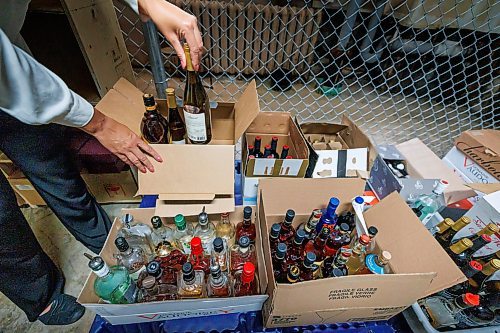 MIKE DEAL / FREE PRESS
Michelle Allard restaurant manager at 529 Wellington boxes up the American liquor that has been taken off the menu.
Wow Hospitality, which owns 529 Wellington, is pulling roughly $500,000 worth of U.S. alcohol from its shelves in &#x201c;solidarity.&#x201d;
Reporter: Gabrielle Piche
250305 - Wednesday, March 05, 2025.