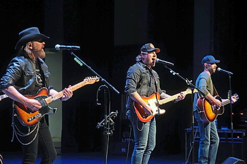 05032025
Country music artists Jason McCoy, Jason Blaine and Chad Brownlee perform together at the Western Manitoba Centennial Auditorium as part of their The Great Canadian Roadtrip 2.0 tour on Wednesday evening.
(Tim Smith/The Brandon Sun)