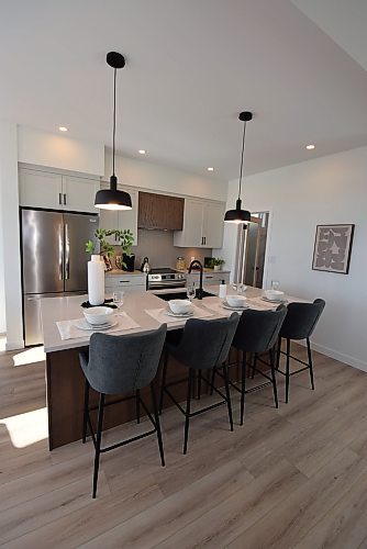 Todd Lewys / Free Press
The gorgeous island kitchen offers a deft balance of utility and style.