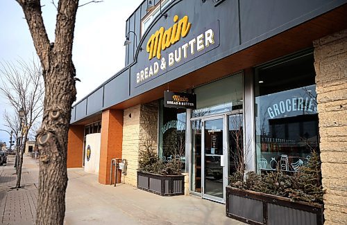 Ruth Bonneville / Free Press
INTERSECTION - Steinbach, Main Bread and Butter
Exterior photo of Main Bread and Butter.
For an Intersection piece on Main Bread & Butter, a specialty grocery store in downtown Steinbach. With all the talk these days of buying local/Canadian, Main Bread and Butter in Steinbach is almost wholly focused on locally made goods since it opened in 1997. They stock products from close to 100 Manitoba makers - from roasted coffee beans to pasta sauce to dessert treats - as well as bake their own bread & cure their own meats for an in-store cafe, a popular meeting spot.
This is for the Saturday March 15
Dave Sanderson story.
March 11th, 2025