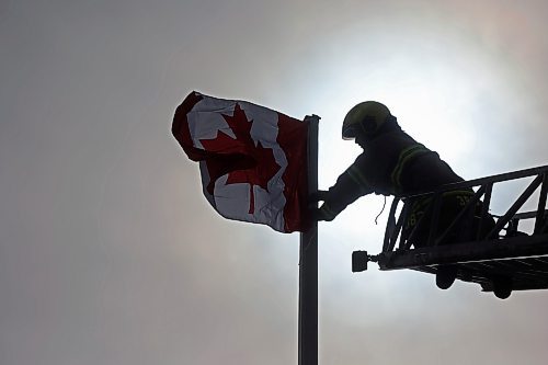 12032025
Devin Gellatly with Brandon Fire and Emergency Services replaces a Canadian flag atop The Dome Building in Brandon on Wednesday afternoon. BFES members took turns at the top of a ladder truck replacing multiple flags at The Dome Building.
(Tim Smith/The Brandon Sun)default