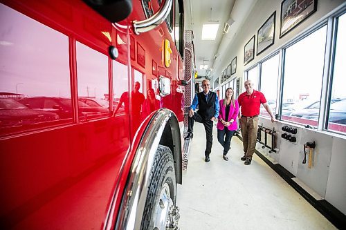 MIKAELA MACKENZIE / FREE PRESS
Brian Nash (left, vice president of sales), Lisa Suche (purchasing manager), and Robert Pike (corporate services manager) at Fort Garry Fire Trucks on Thursday, March 13, 2025.
For Aaron Epp story.
Winnipeg Free Press 2025