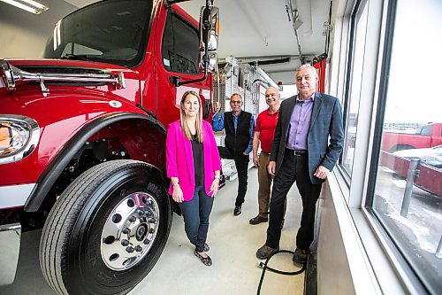 MIKAELA MACKENZIE / FREE PRESS
Lisa Suche (left, purchasing manager), Brian Nash (vice president of sales), Robert Pike (corporate services manager), Jim Peters (president) at Fort Garry Fire Trucks on Thursday, March 13, 2025.
For Aaron Epp story.
Winnipeg Free Press 2025