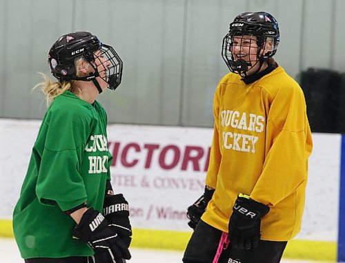 The Assiniboine Cougars have been enjoying the last two weeks of practise but know it will soon be time to get back to business. Kasey Fouillard and Lexy Waddell share a laugh at one of the team's final tune-ups ahead of the ACHA championship. (Matt Packwood/The Brandon Sun)
