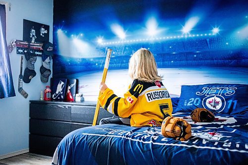 MIKAELA MACKENZIE / FREE PRESS
The boy who has been suspended from all hockey related activities in south Winnipeg by the South Winnipeg Hockey Association (due to his parents filing a defamation lawsuit against the association) in his hockey-themed room on Friday, March 14, 2025.
For Scott story.
Winnipeg Free Press 2025