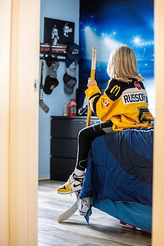 MIKAELA MACKENZIE / FREE PRESS
	

The boy who has been suspended from all hockey related activities in south Winnipeg by the South Winnipeg Hockey Association (due to his parents filing a defamation lawsuit against the association) in his hockey-themed room on Friday, March 14, 2025. 

For Scott story.
Winnipeg Free Press 2025