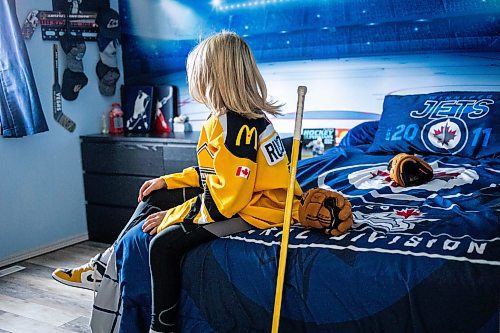 MIKAELA MACKENZIE / FREE PRESS
	

The boy who has been suspended from all hockey related activities in south Winnipeg by the South Winnipeg Hockey Association (due to his parents filing a defamation lawsuit against the association) in his hockey-themed room on Friday, March 14, 2025. 

For Scott story.
Winnipeg Free Press 2025