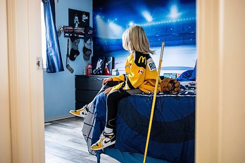 MIKAELA MACKENZIE / FREE PRESS
	

The boy who has been suspended from all hockey related activities in south Winnipeg by the South Winnipeg Hockey Association (due to his parents filing a defamation lawsuit against the association) in his hockey-themed room on Friday, March 14, 2025. 

For Scott story.
Winnipeg Free Press 2025