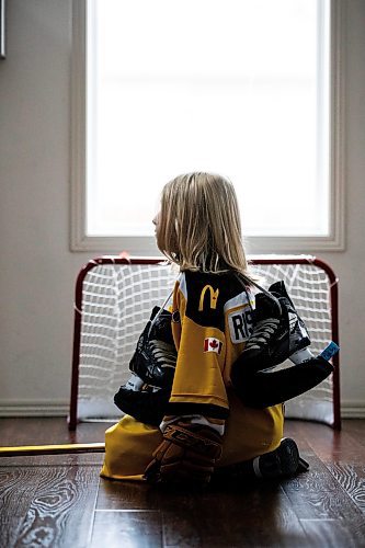 MIKAELA MACKENZIE / FREE PRESS
	

The boy who has been suspended from all hockey related activities in south Winnipeg by the South Winnipeg Hockey Association (due to his parents filing a defamation lawsuit against the association) in his home on Friday, March 14, 2025. 

For Scott story.
Winnipeg Free Press 2025