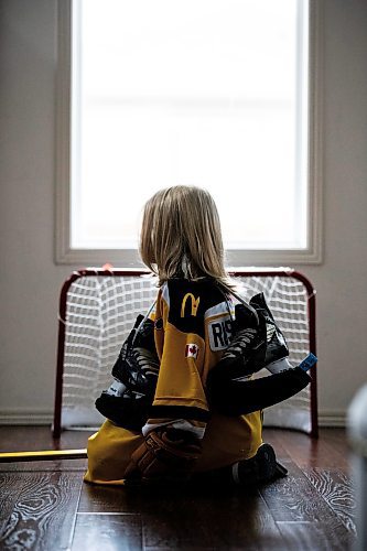 MIKAELA MACKENZIE / FREE PRESS
	

The boy who has been suspended from all hockey related activities in south Winnipeg by the South Winnipeg Hockey Association (due to his parents filing a defamation lawsuit against the association) in his home on Friday, March 14, 2025. 

For Scott story.
Winnipeg Free Press 2025