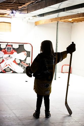 MIKAELA MACKENZIE / FREE PRESS
	

The boy who has been suspended from all hockey related activities in south Winnipeg by the South Winnipeg Hockey Association (due to his parents filing a defamation lawsuit against the association) in his basement training area on Friday, March 14, 2025. 

For Scott story.
Winnipeg Free Press 2025