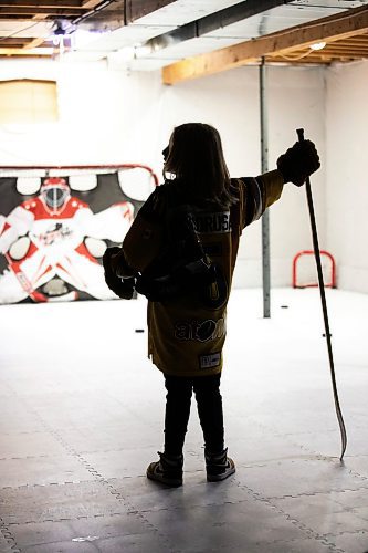 MIKAELA MACKENZIE / FREE PRESS
	

The boy who has been suspended from all hockey related activities in south Winnipeg by the South Winnipeg Hockey Association (due to his parents filing a defamation lawsuit against the association) in his basement training area on Friday, March 14, 2025. 

For Scott story.
Winnipeg Free Press 2025