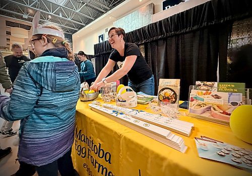 SCOTT BILLECK / FREE PRESS
Sandra Dyck, an egg farmer from Springstein, west of Winnipeg, hands out recipes and egg-related trinkets to visitors at her booth at Agriculture in the City at Winnipeg's Outlet Collection Mall, an annual event that promotes the agriculture and agri-food industry in Manitoba.