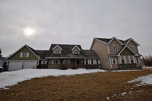 Todd Lewys / Free Press
Essentially two homes in one, the 4,700-sq.-ft. residence, situated on a mature, five-acre lot, is perfect for a large, or multi-generational family.