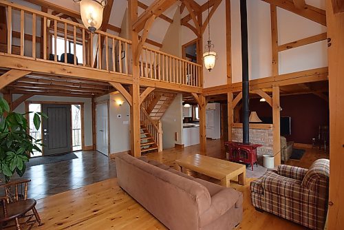 Todd Lewys / Free Press
The home starts with a generous, tiled foyer opening onto the original home, and its lodge-like main living area with its magnificent timber-frame design.