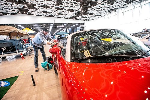 MIKAELA MACKENZIE / FREE PRESS
Ron Janzen shines up his 2006 Pontiac Solstice (The Mallet edition - number sixteen out of only one hundred made that year) in preparation for the World of Wheels event at the RBC Convention Centre on Thursday, March 20, 2025.
Standup.
Winnipeg Free Press 2025