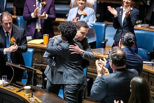 MIKAELA MACKENZIE / FREE PRESS
Finance minister Adrien Sala hugs health minister Uzoma Asagwara after delivering the budget speech at the Manitoba Legislative Building on Thursday, March 20, 2025.
For budget stories.
Winnipeg Free Press 2025