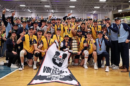 21032025
The Brandon Bobcats celebrate their 2025 U SPORTS Men's Volleyball Championship gold medal victory against University of Alberta Golden Bears at the Brandon University Healthy Living Centre on Sunday evening. The Bobcats defeated the Golden Bears in four sets. (Tim Smith/The Brandon Sun)