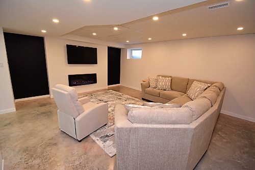 Todd Lewys / Free Press
A beautiful media area is just one part of the 1,400-sq.-ft.-plus lower level, which also offers a secondary kitchen, two-piece bath and an office area that could be converted into a bedroom.