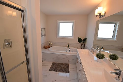 Todd Lewys / Free Press
The roomy ensuite is a luxurious, spa-inspired space.