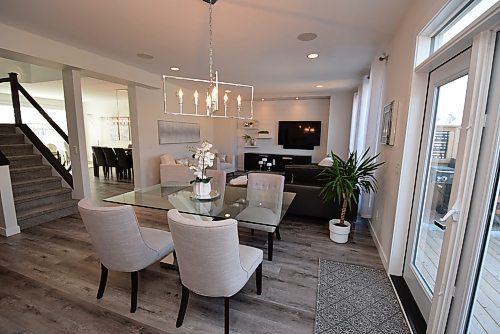 Todd Lewys / Free Press
Flow from the main living area into the dining/sitting area at the front of the home is seamless thanks to a five-foot-wide doorway that unites to the two spaces.