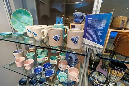 MIKE DEAL / FREE PRESS
The CMHR Boutique at the Canadian Museum for Human Rights, 85 Israel Asper Way, where customers can purchase museum merchandise, books, clothing, Jewelry and items made by local and Canadian artists.
A display of ceramic pieces made by local artist Kelli Rey.
Reporter: AV KItching
250226 - Wednesday, February 26, 2025.