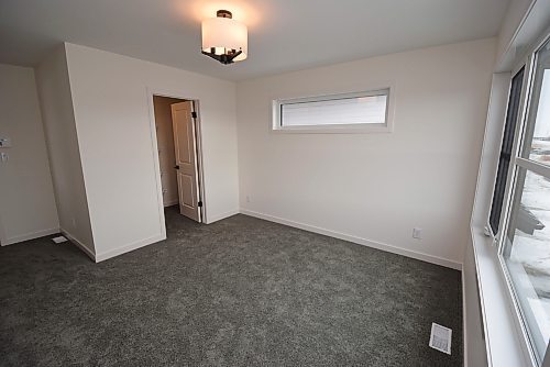Todd Lewys / Free Press
The spacious, private and light-filled primary bedroom comes with an oversized walk-in closet with free-slide shelving.