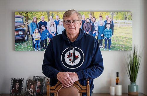 JOHN WOODS / WINNIPEG FREE PRESS
John Funk, who is awaiting heart surgery, is photographed with a family photo in his home in Niverville Monday, March 25, 2025. Funk was told that he needed bypass within four days after an angiogram in January, Funk has not received the surgeon, in-fact, he is still waiting to see a surgeon.

Reporter: chris