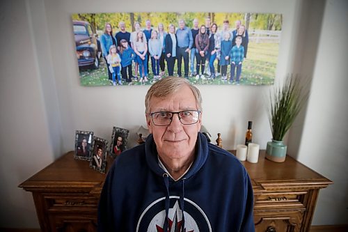 JOHN WOODS / WINNIPEG FREE PRESS
John Funk, who is awaiting heart surgery, is photographed with a family photo in his home in Niverville Monday, March 25, 2025. Funk was told that he needed bypass within four days after an angiogram in January, Funk has not received the surgeon, in-fact, he is still waiting to see a surgeon.

Reporter: chris