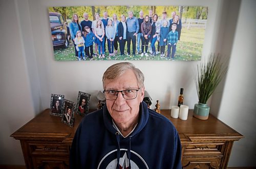 JOHN WOODS / WINNIPEG FREE PRESS
John Funk, who is awaiting heart surgery, is photographed with a family photo in his home in Niverville Monday, March 25, 2025. Funk was told that he needed bypass within four days after an angiogram in January, Funk has not received the surgeon, in-fact, he is still waiting to see a surgeon.

Reporter: chris