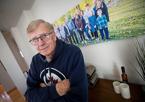 JOHN WOODS / WINNIPEG FREE PRESS
John Funk, who is awaiting heart surgery, is photographed with a family photo in his home in Niverville Monday, March 25, 2025. Funk was told that he needed bypass within four days after an angiogram in January, Funk has not received the surgeon, in-fact, he is still waiting to see a surgeon.

Reporter: chris