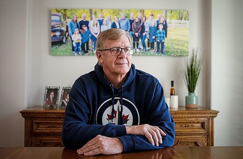 JOHN WOODS / WINNIPEG FREE PRESS
John Funk, who is awaiting heart surgery, is photographed with a family photo in his home in Niverville Monday, March 25, 2025. Funk was told that he needed bypass within four days after an angiogram in January, Funk has not received the surgeon, in-fact, he is still waiting to see a surgeon.

Reporter: chris