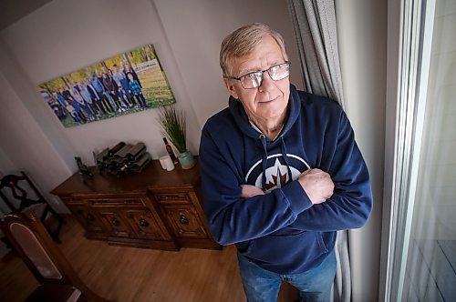 JOHN WOODS / WINNIPEG FREE PRESS
John Funk, who is awaiting heart surgery, is photographed with a family photo in his home in Niverville Monday, March 25, 2025. Funk was told that he needed bypass within four days after an angiogram in January, Funk has not received the surgeon, in-fact, he is still waiting to see a surgeon.

Reporter: chris