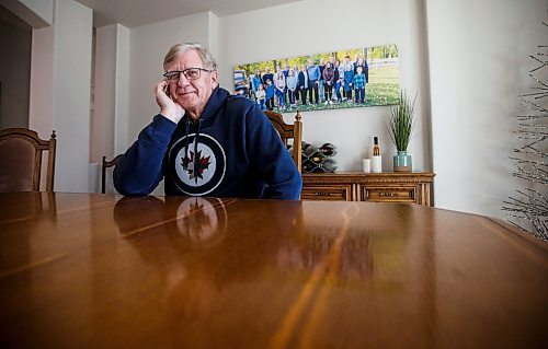 JOHN WOODS / WINNIPEG FREE PRESS
John Funk, who is awaiting heart surgery, is photographed with a family photo in his home in Niverville Monday, March 25, 2025. Funk was told that he needed bypass within four days after an angiogram in January, Funk has not received the surgeon, in-fact, he is still waiting to see a surgeon.

Reporter: chris