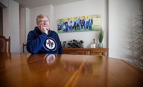 JOHN WOODS / WINNIPEG FREE PRESS
John Funk, who is awaiting heart surgery, is photographed with a family photo in his home in Niverville Monday, March 25, 2025. Funk was told that he needed bypass within four days after an angiogram in January, Funk has not received the surgeon, in-fact, he is still waiting to see a surgeon.

Reporter: chris