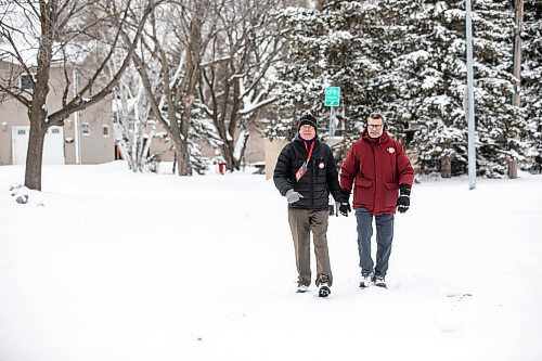 MIKAELA MACKENZIE / FREE PRESS
Liberal candidate for Winnipeg West Doug Eyolfson (right) and campaign crew member Jon Gerrard door-knock in the riding on Friday, March 28, 2025.
For Malak story.
Winnipeg Free Press 2025