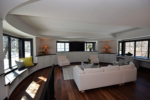 Todd Lewys /  Free Press
Surrounded by windows, the oval-shaped media area features an oval tray ceiling, retractable big-screen TV and treetop views.