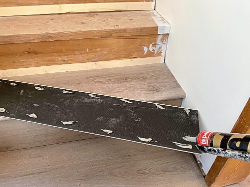 Marc LaBossiere / Free Press
The rise is mounted using construction adhesive, applied along the areas of the lumber nosing and shim. 