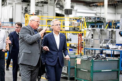 MIKAELA MACKENZIE / FREE PRESS
	

New Flyer Industries president and CEO Paul Soubry gives Liberal Leader Mark Carney a tour of the facility in Winnipeg on Tuesday, April 1, 2025.

For Malak story.
Winnipeg Free Press 2025