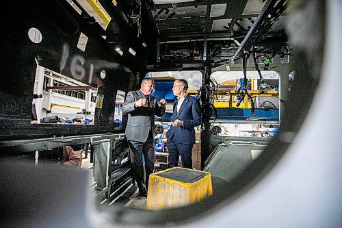 MIKAELA MACKENZIE / FREE PRESS
	

New Flyer Industries president and CEO Paul Soubry gives Liberal Leader Mark Carney a tour of the facility in Winnipeg on Tuesday, April 1, 2025.

For Malak story.
Winnipeg Free Press 2025
