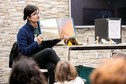 MIKAELA MACKENZIE / FREE PRESS
	

Prairie Wildlife Rehabilitation Centre education coordinator Julia Burcar reads and shares animal knowledge with children at the Osborne Library on Thursday, April 3, 2025. 

Standup.
Winnipeg Free Press 2025