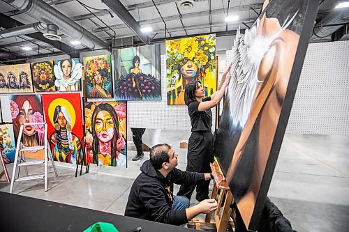 MIKAELA MACKENZIE / FREE PRESS
Ghadir Ghali places her piece Breaking Free with help from Sam Alkersh at the Winnipeg Fine Art Fair at the Red River Exhibition Park on Friday, April 4, 2025. The event starts Friday at 4:00pm and runs all weekend.
Standup.
Winnipeg Free Press 2025